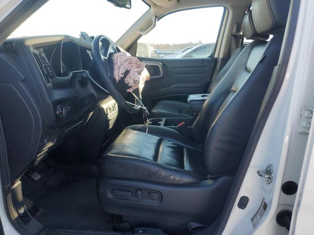Photo 7 from auction – 2014 HONDA RIDGELINE with VIN 5FPYK1F61EB009773