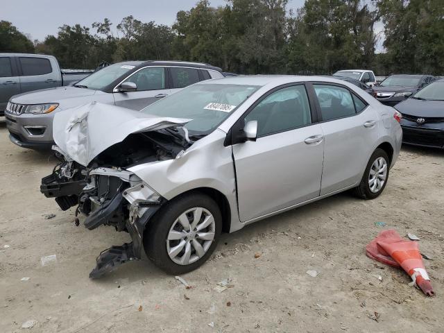 TOYOTA COROLLA L 2016 with VIN 5YFBURHE7GP484007 - Photo from auction