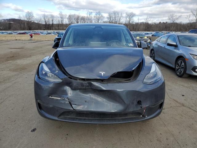 Снимка 5 от търг – 2023 TESLA MODEL Y с VIN 7SAYGDEE7PA192877