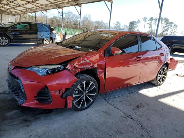 TOYOTA COROLLA L 2018 with VIN 5YFBURHE1JP823870 - Photo from auction