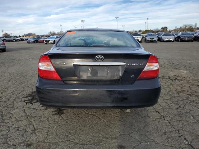 Photo 6 from auction – 2004 TOYOTA CAMRY LE with VIN 4T1BF30K44U078768