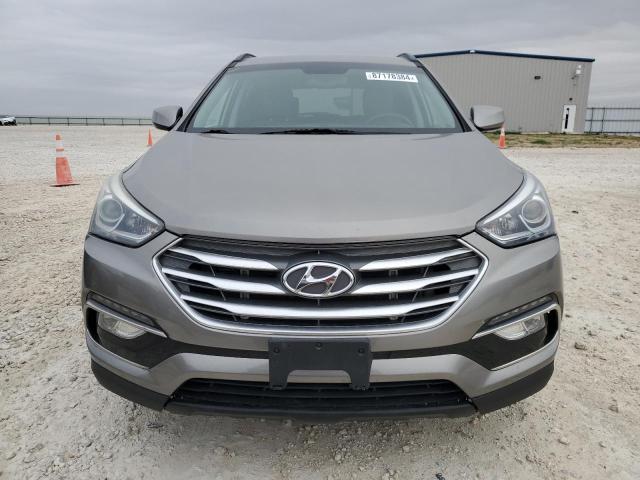 Photo 5 from auction – 2017 HYUNDAI SANTA FE S with VIN 5NMZU3LB0HH001848