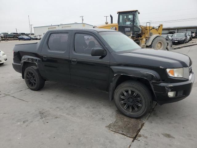 Photo 4 from auction – 2011 HONDA RIDGELINE with VIN 5FPYK1F21BB009541
