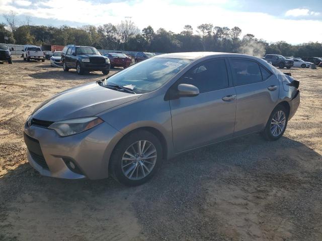 TOYOTA COROLLA L 2014 with VIN 5YFBURHE2EP069058 - Photo from auction
