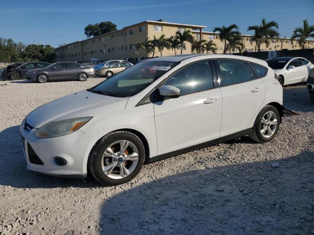 FORD FOCUS SE 2013 with VIN 1FADP3K21DL211859 - Photo from auction