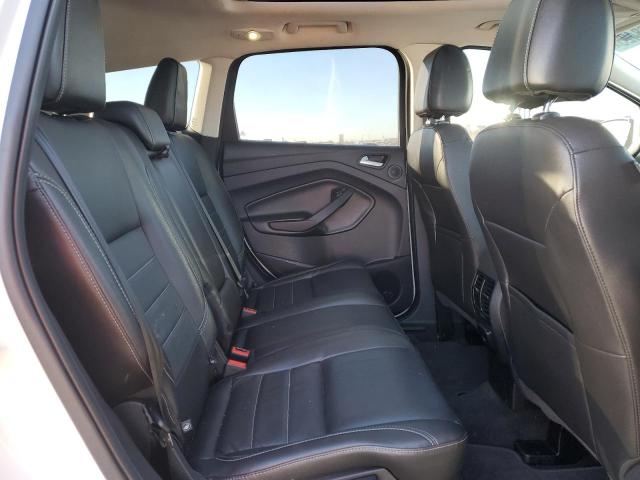Photo 11 from auction – 2016 FORD ESCAPE TIT with VIN 1FMCU0J97GUA09209