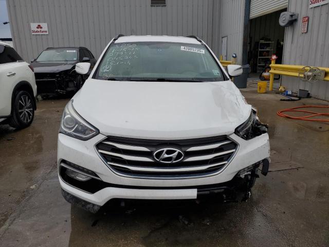 Photo 5 from auction – 2017 HYUNDAI SANTA FE S with VIN 5NMZU3LB5HH045263