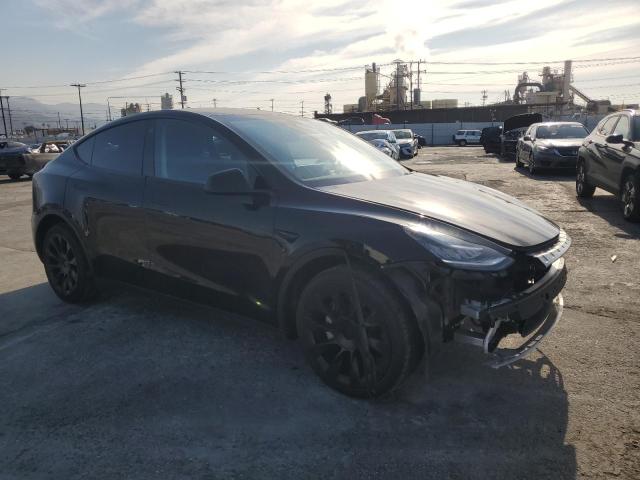 Photo 4 from auction – 2023 TESLA MODEL Y with VIN 7SAYGDEE2PA050565