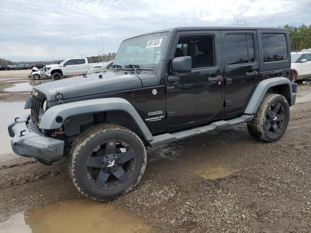 JEEP WRANGLER U 2012 with VIN 1C4BJWDG9CL218778 - Photo from auction