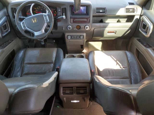 Photo 8 from auction – 2006 HONDA RIDGELINE with VIN 2HJYK16526H516320