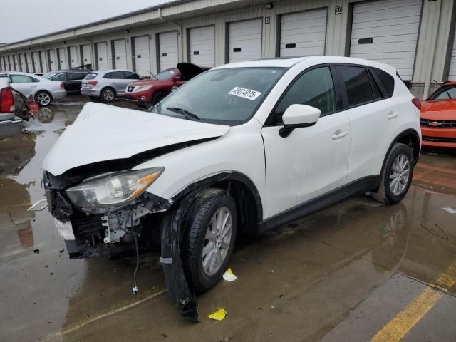 MAZDA CX-5 TOURI 2014 with VIN JM3KE2CY0E0425921 - Photo from auction