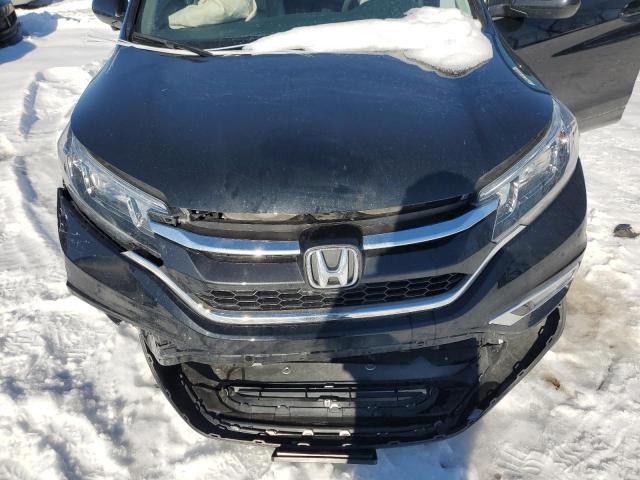 Photo 11 from auction – 2016 HONDA CR-V EX with VIN 2HKRM3H50GH564483