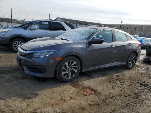 HONDA CIVIC EX 2018 with VIN 2HGFC2F72JH546685 - Photo from auction