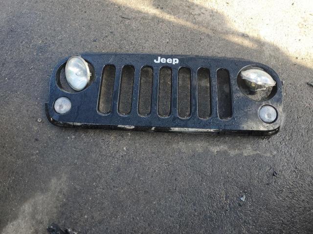 Photo 13 from auction – 2014 JEEP WRANGLER U with VIN 1C4BJWFG8EL166821