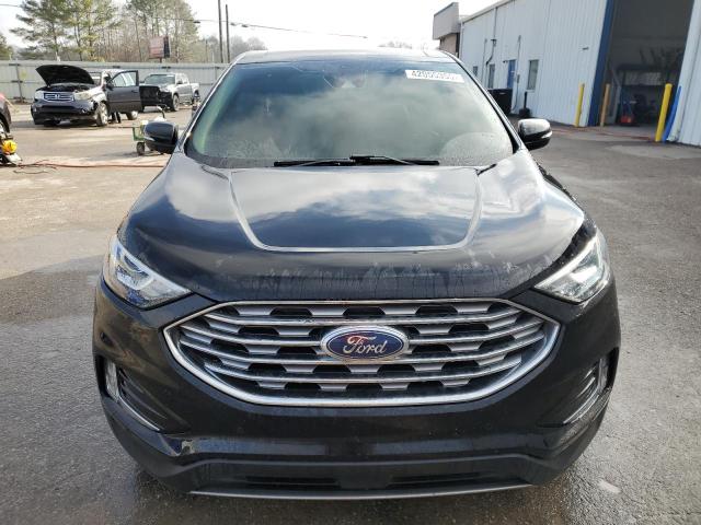 Photo 5 from auction – 2021 FORD EDGE TITAN with VIN 2FMPK3K98MBA07817