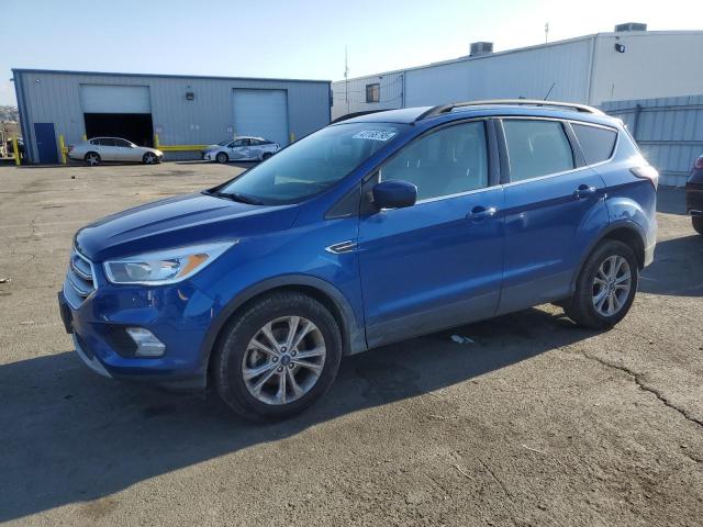 FORD ESCAPE SE 2018 with VIN 1FMCU0GD3JUD05704 - Photo from auction