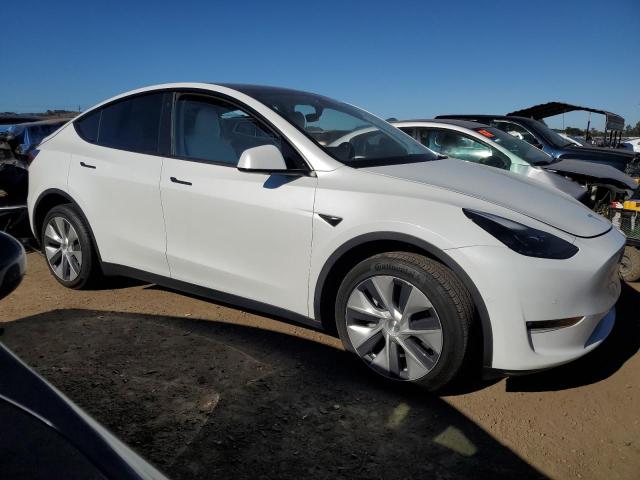 Photo 4 from auction – 2022 TESLA MODEL Y with VIN 7SAYGDEE8NF515804