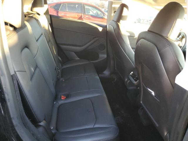 Photo 11 from auction – 2023 TESLA MODEL Y with VIN 7SAYGDEF4PF706762
