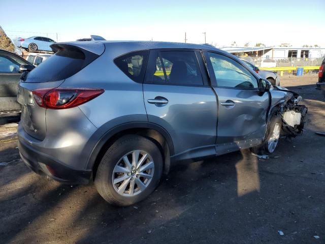 Photo 3 from auction – 2014 MAZDA CX-5 TOURI with VIN JM3KE2CY4E0358577