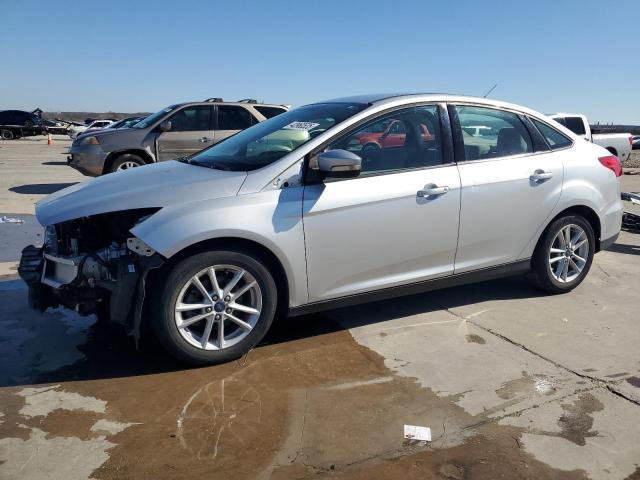 FORD FOCUS SE 2015 with VIN 1FADP3F23FL242964 - Photo from auction