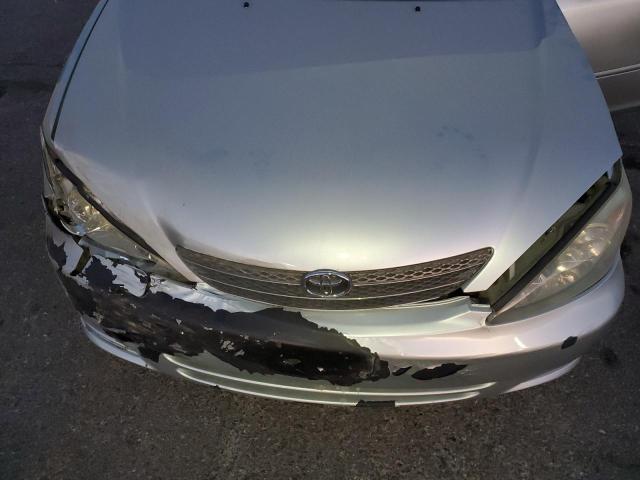 Photo 11 from auction – 2004 TOYOTA CAMRY LE with VIN JTDBE32K340261803