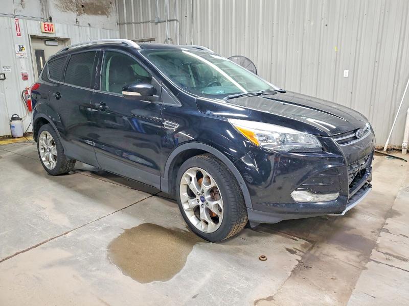Photo 4 from auction – 2016 FORD ESCAPE TIT with VIN 1FMCU0J90GUC40016