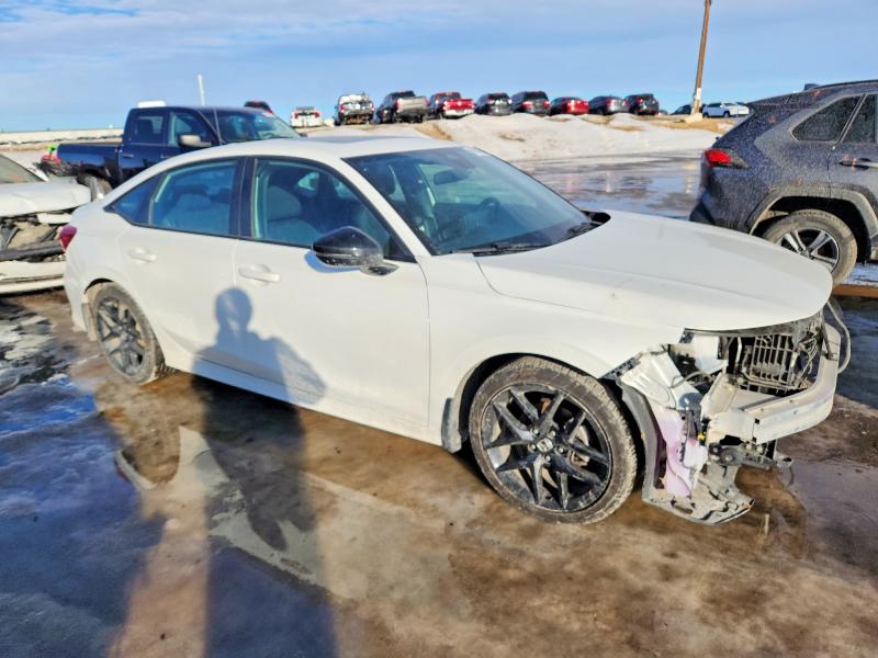 Photo 4 from auction – 2022 HONDA CIVIC SPOR with VIN 2HGFE2F58NH130803