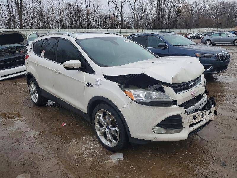 Photo 4 from auction – 2015 FORD ESCAPE TIT with VIN 1FMCU9J99FUB39236