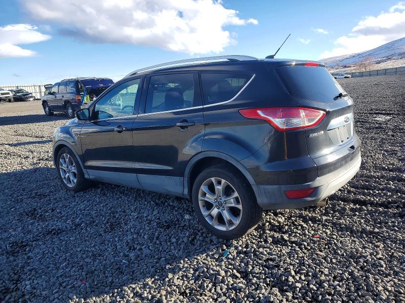 Photo 2 from auction – 2013 FORD ESCAPE with VIN 1FMCU9H92DUA17353