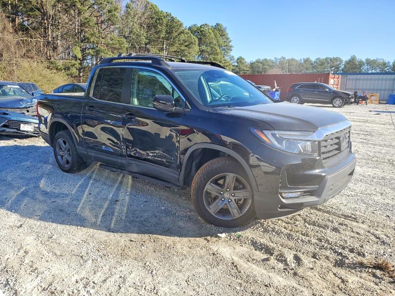 Photo 4 from auction – 2021 HONDA RIDGELINE with VIN 5FPYK3F59MB020442