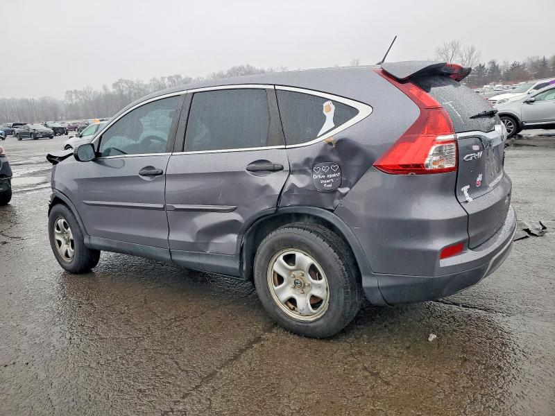 Photo 2 from auction – 2016 HONDA CR-V LX with VIN 5J6RM4H33GL117690