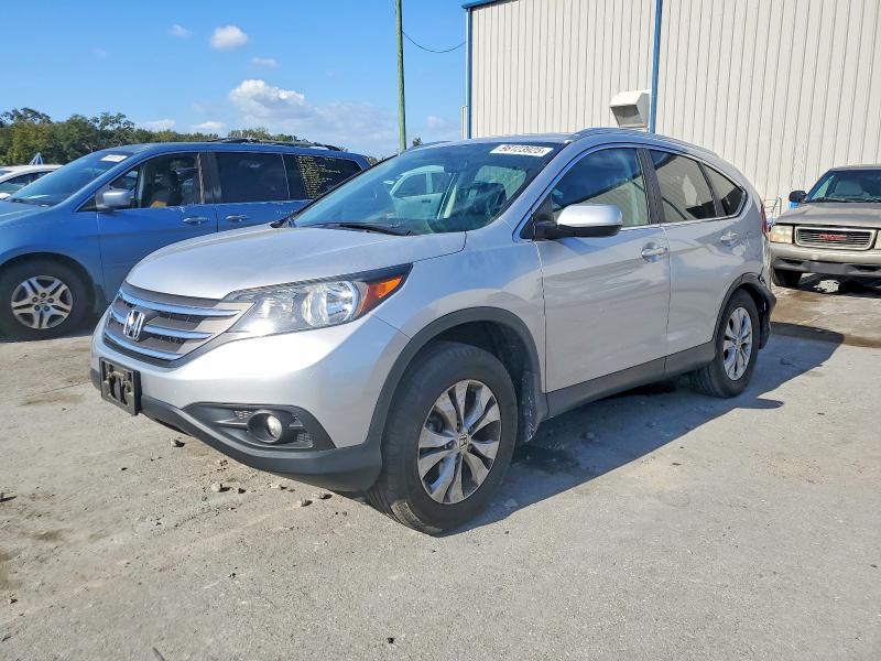 HONDA CR-V 2014 with VIN 2HKRM3H72EH557873 - Photo from auction