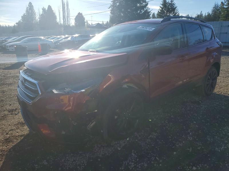 FORD ESCAPE SE 2018 with VIN 1FMCU9GD8JUA57552 - Photo from auction
