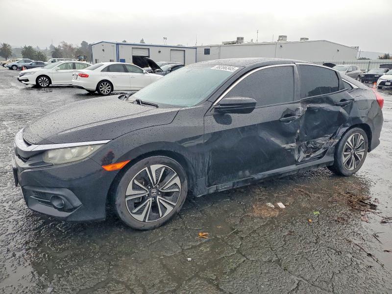 Photo 1 from auction – 2016 HONDA CIVIC EX with VIN 2HGFC1F39GH645827