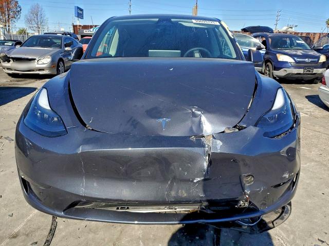 Photo 5 from auction – 2023 TESLA MODEL Y with VIN 7SAYGDED6PF963470