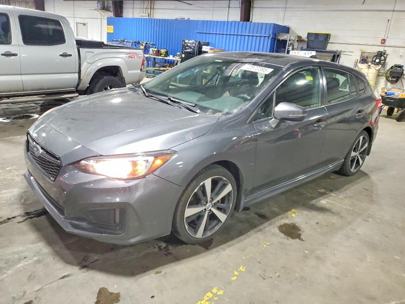 SUBARU IMPREZA 2018 with VIN 4S3GTAL60J3703027 - Photo from auction