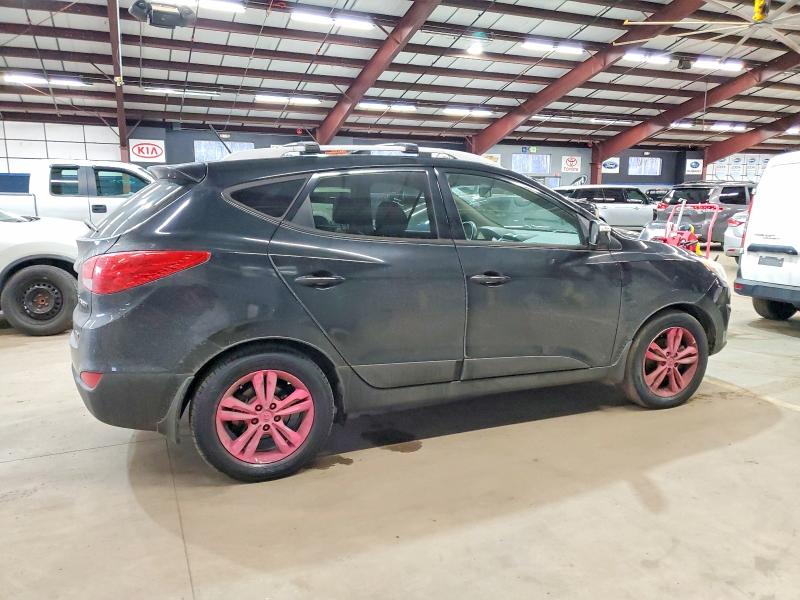 Photo 3 from auction – 2012 HYUNDAI TUCSON with VIN KM8JUCAC1CU416778
