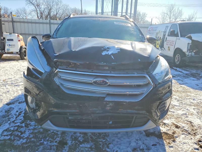 Photo 5 from auction – 2018 FORD ESCAPE SE with VIN 1FMCU0GD2JUC29084
