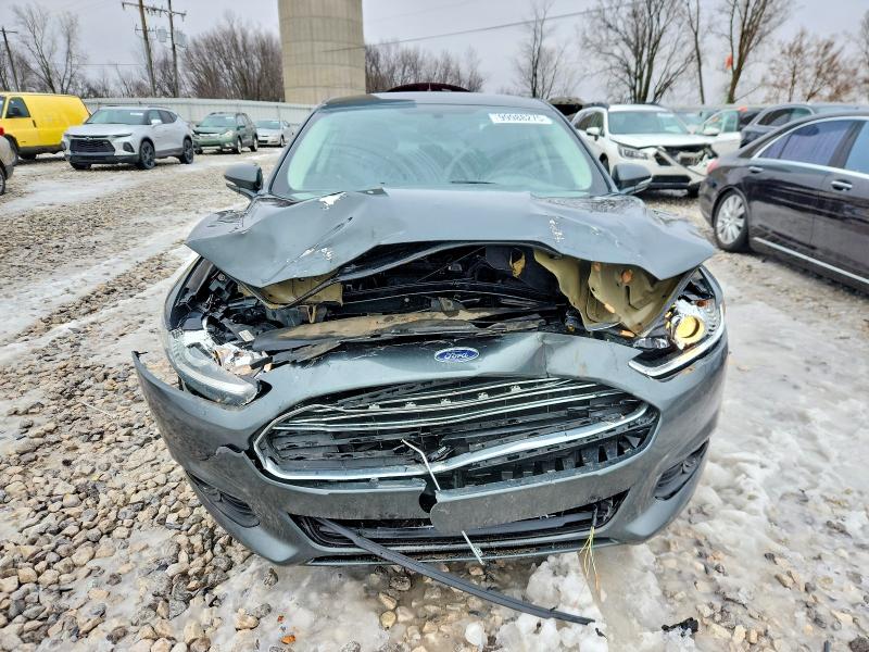 Foto 5 de la subasta – 2015 FORD FUSION con VIN 3FA6P0H71FR136403