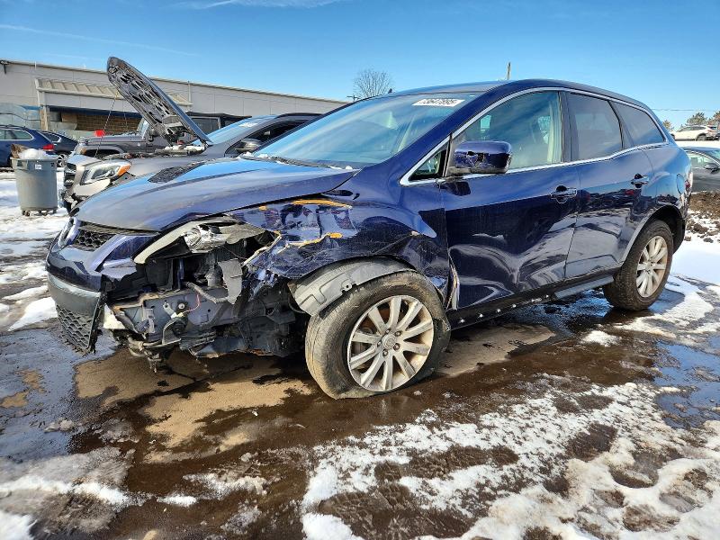 MAZDA CX-7 2011 with VIN JM3ER2BMXB0386119 - Photo from auction