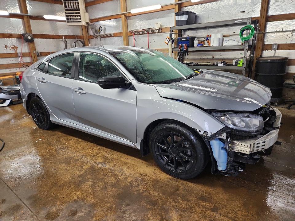 Photo 4 from auction – 2018 HONDA CIVIC LX with VIN 19XFC2F52JE037348