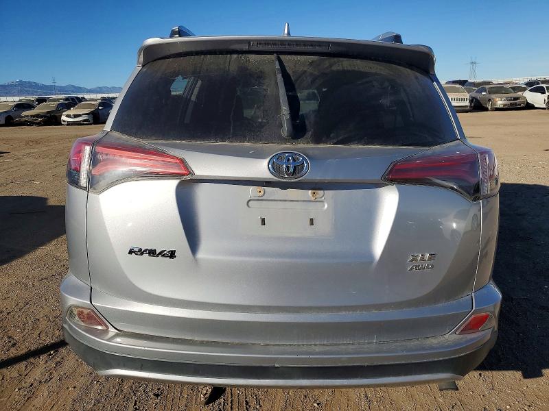Photo 6 from auction – 2016 TOYOTA RAV4 with VIN 2T3RFREV2GW451970