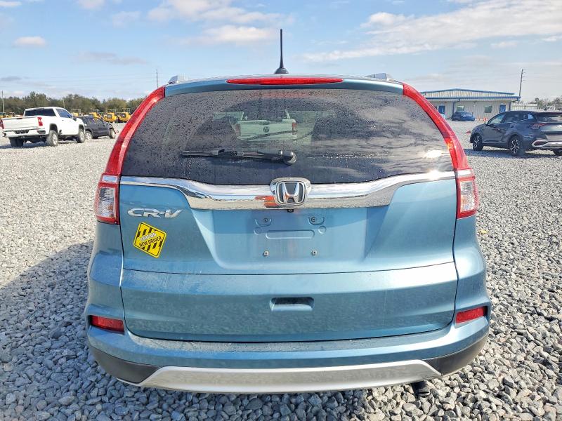 Photo 6 from auction – 2015 HONDA CR-V with VIN 2HKRM3H73FH540114