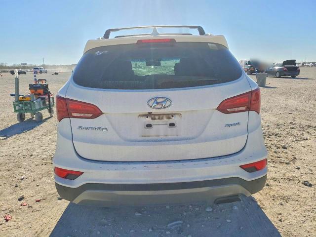 Photo 6 from auction – 2018 HYUNDAI SANTA FE S with VIN 5NMZU3LB4JH065042