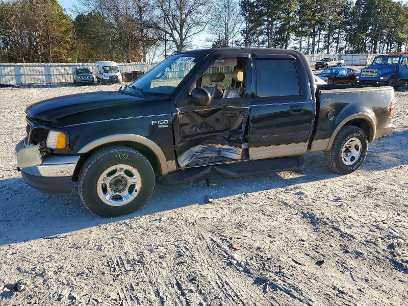 FORD F150 SUPER 2001 with VIN 1FTRW07L31KB66301 - Photo from auction