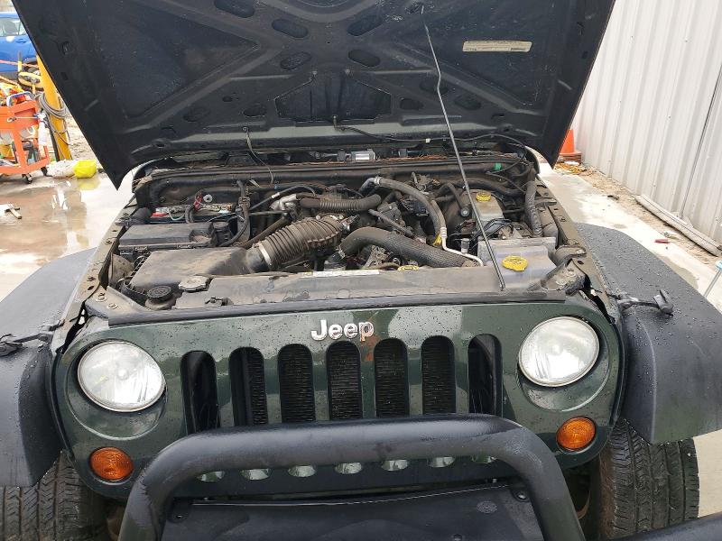 Photo 12 from auction – 2011 JEEP WRANGLER U with VIN 1J4BA3H13BL502159