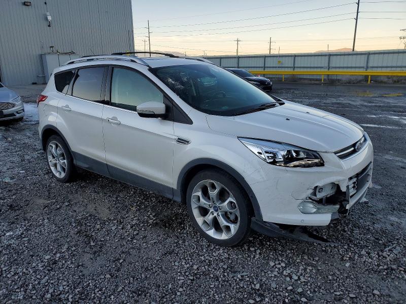Photo 4 from auction – 2015 FORD ESCAPE TIT with VIN 1FMCU0J90FUC55131