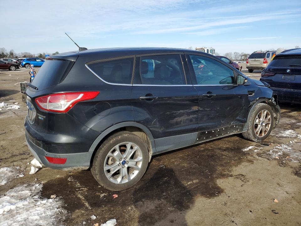 Photo 3 from auction – 2014 FORD ESCAPE TIT with VIN 1FMCU9J92EUA18563
