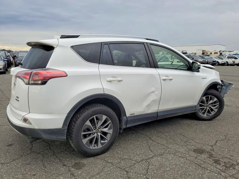 Photo 3 from auction – 2017 TOYOTA RAV4 HV with VIN JTMRJREV0HD110564