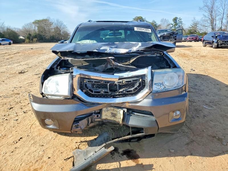 Photo 5 from auction – 2011 HONDA PILOT TOUR with VIN 5FNYF4H97BB101844